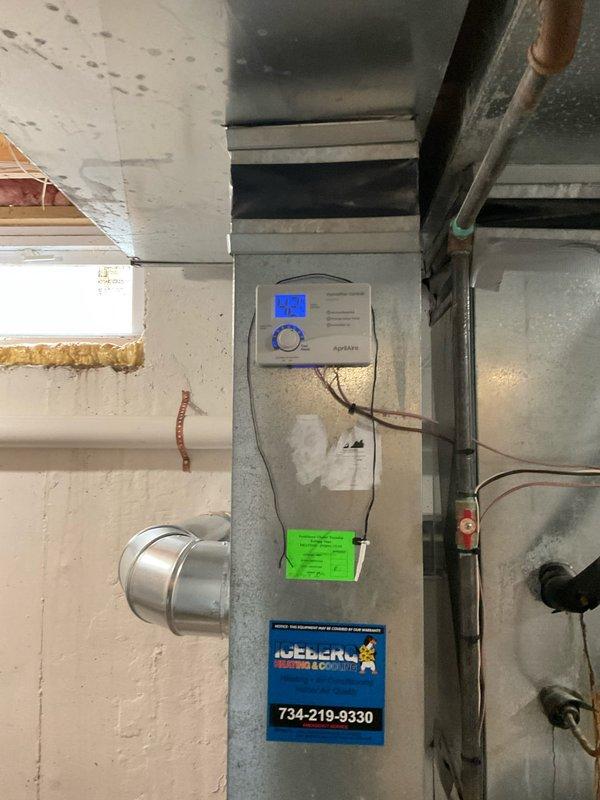 Conducted on-site evaluation for HVAC system replacement at residential property. Assessed existing outdoor condensing unit positioned on concrete pad adjacent to gas meter assembly, noting standard installation configuration with PVC condensate drainage lines. Evaluated indoor furnace unit in basement mechanical room, documenting current equipment specifications via digital control panel and existing service labels. Photographed both exterior and interior components to provide comprehensive documentation for replacement estimate preparation. Generated two separate quote options for system replacement consideration.