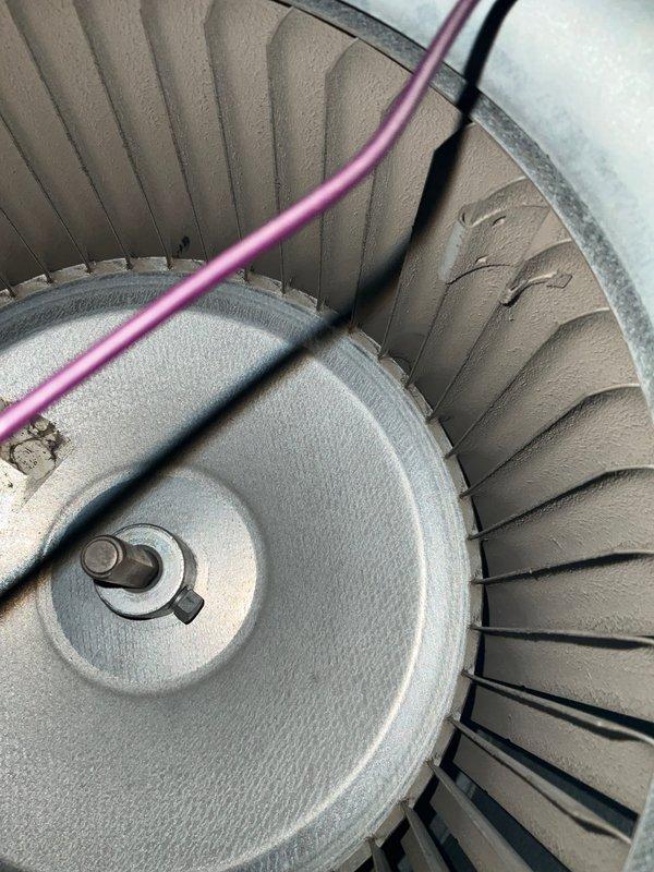 Completed Club AC8-12 preventive maintenance agreement visit on air conditioning system. Performed comprehensive inspection of blower motor assembly and evaporator coil components, documenting equipment condition with photographs showing refrigerant lines and motor housing with normal operational characteristics.