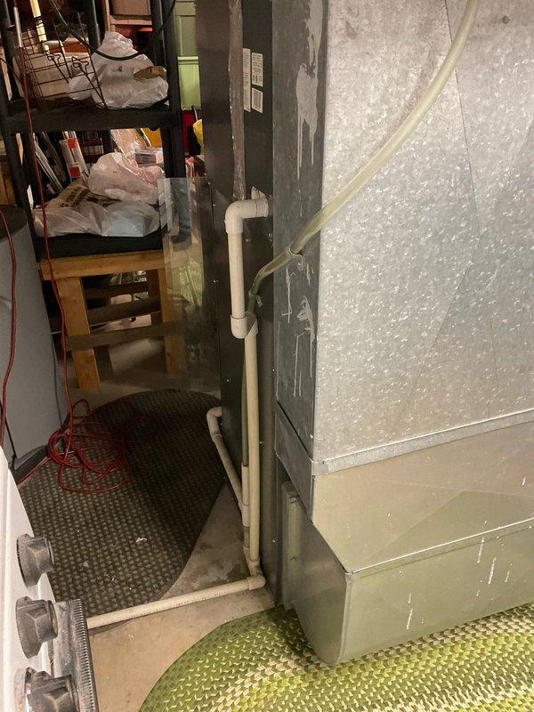 Conducted on-site HVAC system evaluation for equipment replacement estimate. Documented existing furnace and air conditioning unit model numbers and specifications. Photographed current equipment installation including basement furnace unit and exterior condensing unit location near gas meter to provide accurate system assessment for replacement options.