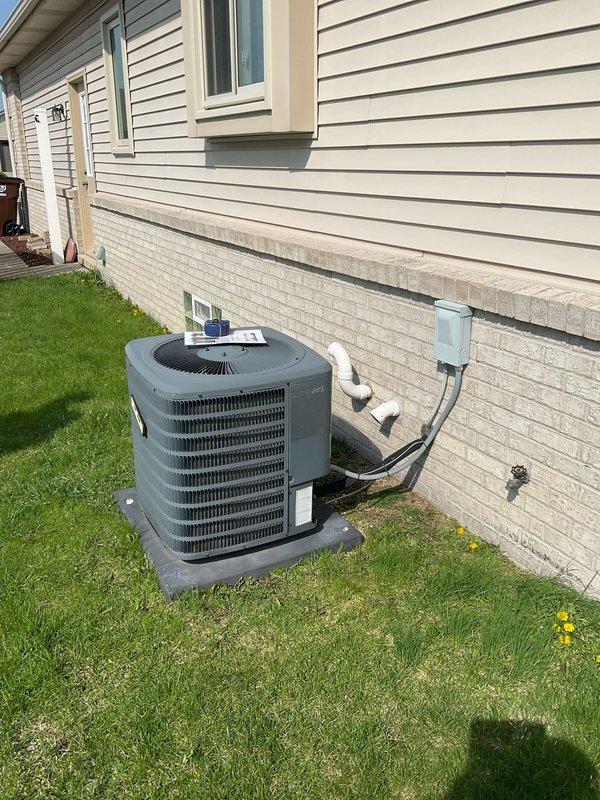 Completed comprehensive system estimate for complete HVAC replacement including outdoor condensing unit and indoor furnace assembly. Documented existing equipment configuration showing outdoor AC unit on pad with electrical disconnect and refrigerant line set, plus basement furnace installation with PVC venting and ductwork connections. Provided multiple replacement options under quote numbers 03592-01 and 03592-03 covering various system capacities and efficiency ratings suitable for residential application.