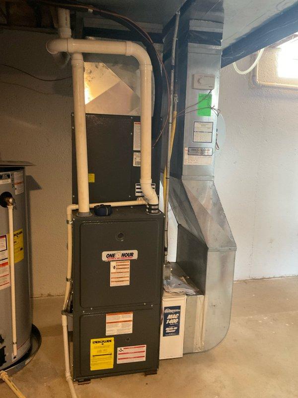 Completed comprehensive system estimate for complete HVAC replacement including outdoor condensing unit and indoor furnace assembly. Documented existing equipment configuration showing outdoor AC unit on pad with electrical disconnect and refrigerant line set, plus basement furnace installation with PVC venting and ductwork connections. Provided multiple replacement options under quote numbers 03592-01 and 03592-03 covering various system capacities and efficiency ratings suitable for residential application.