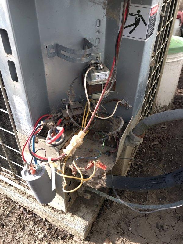 Completed annual AC maintenance tune-up on outdoor condensing unit as part of prepaid membership agreement. Upon inspection, discovered significant dirt, debris, and soil contamination throughout electrical compartment, including buildup on wiring connections, capacitor, and internal components. Thoroughly cleaned electrical compartment, removing accumulated dirt and corrosion from all surfaces, wire connections, and mounting hardware. Inspected all electrical connections and wire nuts for integrity and proper termination. Verified capacitor condition and secure mounting. Tested system operation and confirmed unit functioning properly following cleaning and maintenance procedures.