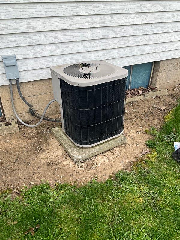 Completed preventive maintenance inspection under Club AC8-12 agreement on residential split system air conditioning unit. Performed comprehensive system evaluation including blower wheel inspection, which revealed normal operational condensation on assembly with blades and housing in serviceable condition. Inspected outdoor condensing unit positioned on concrete pad with proper clearances maintained. Verified electrical disconnect box and conduit connections secure. Unit operating within normal parameters with no immediate service needs identified. All components inspected and found to be functioning as designed for continued reliable operation.