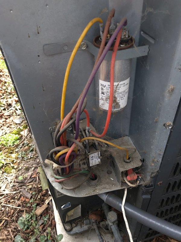 Completed preventative maintenance inspection on outdoor condensing unit as part of CLUB AC 10-2 agreement. Unit operational with noted exterior insulation deterioration at base requiring future attention. Inspected electrical components including capacitor and contactor, verified proper connections, and documented accumulated debris in outdoor installation area.