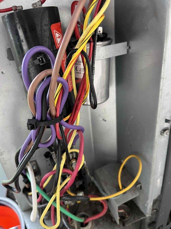 Completed scheduled AC maintenance tune-up on air conditioning system with vertical air handler installation. Performed comprehensive system inspection including electrical components, control board, blower motor assembly, and capacitor testing using diagnostic meter. All components operating within normal parameters, system tested and confirmed ready for cooling season.