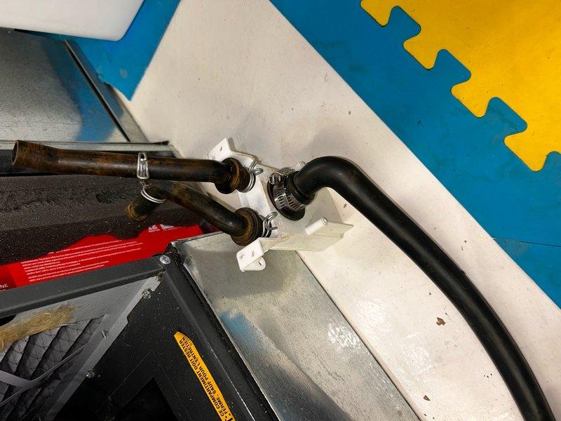 Completed routine HVAC maintenance inspection and service under Club AC/Club Heat 8-12 agreement. Removed, inspected, and photographed evaporator coil distributor tubes showing oxidation and wear patterns consistent with normal operation. System components evaluated for proper function and documented current condition with photographic records for maintenance history tracking.