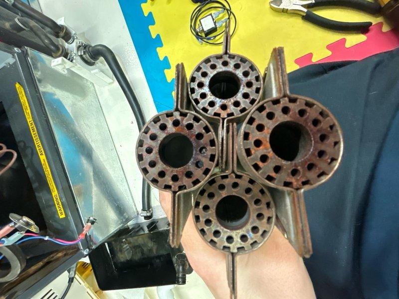 Completed routine HVAC maintenance inspection and service under Club AC/Club Heat 8-12 agreement. Removed, inspected, and photographed evaporator coil distributor tubes showing oxidation and wear patterns consistent with normal operation. System components evaluated for proper function and documented current condition with photographic records for maintenance history tracking.