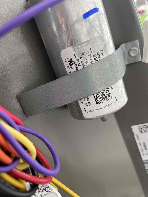 Completed prepaid AC maintenance tune-up on Lennox outdoor condensing unit. Performed comprehensive system inspection including verification of unit level, inspection of capacitor and electrical connections, and evaluation of condenser coil condition. All electrical components found secure with proper wire connections intact. Unit operating within normal parameters with no issues identified requiring immediate attention.