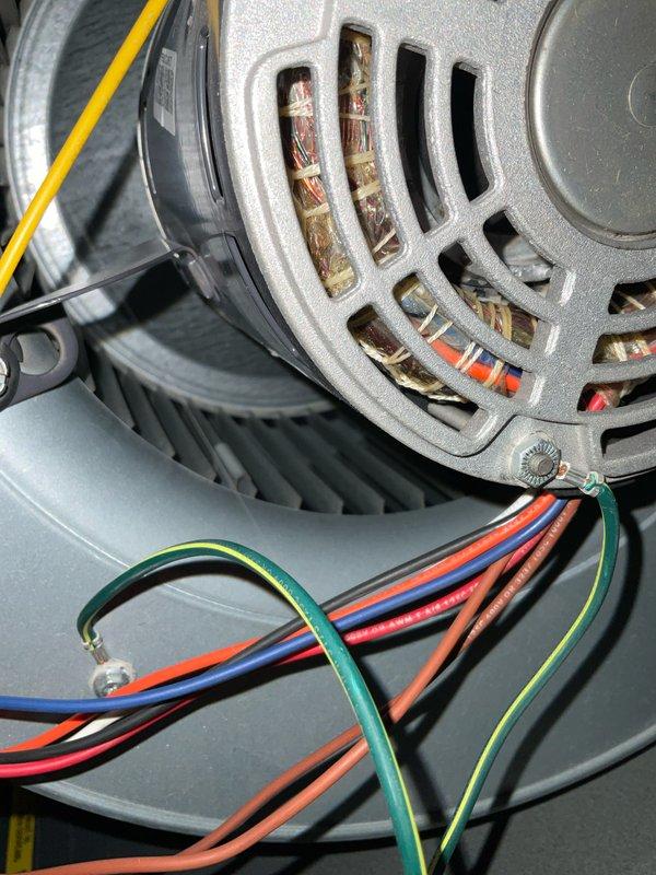 Completed preventive maintenance tune-up on air conditioning system. Performed comprehensive inspection of blower motor assembly, verifying proper operation of motor windings and electrical connections. Inspected and tested contactor relay mechanism, confirmed all terminal connections secure despite visible age-related oxidation on contact points. Documented equipment condition with photos showing normal wear patterns consistent with system age. All components operating within manufacturer specifications at time of service.