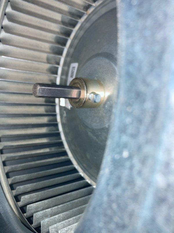 Performed preventative maintenance agreement visit on air conditioning system. Upon inspection, discovered significant ice buildup on refrigerant lines and evaporator coil, indicating restricted airflow or low refrigerant charge. Removed and inspected blower wheel assembly, which showed normal operational wear. System requires further diagnostic evaluation to determine root cause of icing condition and restore proper cooling operation.