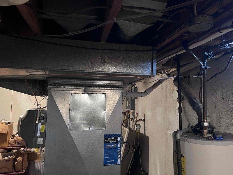 Responded to possible recall notice regarding condensate line leak. Performed AC system startup inspection and documented existing HVAC equipment configuration including furnace, ductwork, and associated components. System evaluated and photographed for warranty documentation purposes.