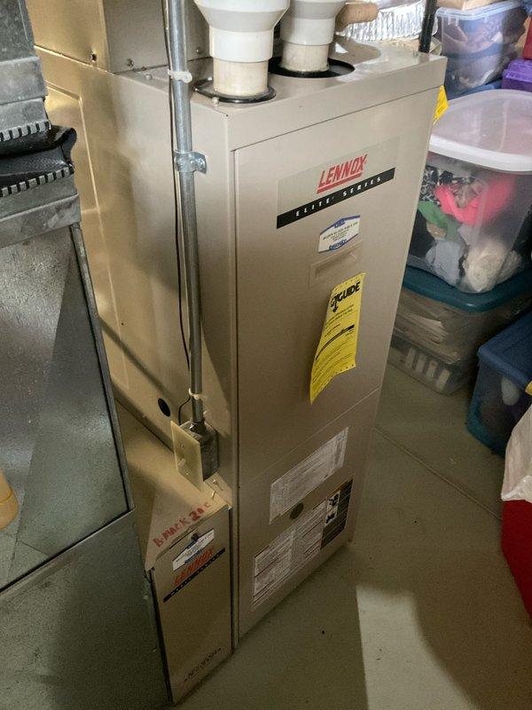 Performed on-site assessment of 2003 Lennox Elite Series furnace with failed heat exchanger. Documented existing equipment condition and installation configuration, including PVC venting system and ductwork connections. Prepared comprehensive replacement estimate for single component furnace upgrade to address heat exchanger failure and restore heating system functionality.