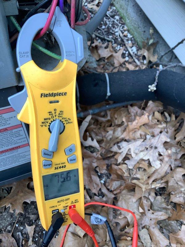 Responded to emergency no-cooling call and performed diagnostic evaluation of residential air conditioning system. Upon arrival, inspected electrical panel and verified proper circuit breaker operation and power supply to HVAC equipment. Proceeded to outdoor condensing unit where significant leaf debris accumulation was discovered around the equipment. Utilized Fieldpiece clamp meter to measure electrical parameters and diagnose system performance issues. The accumulated debris was restricting airflow to the condenser coil, causing reduced cooling capacity and potential system shutdown due to high-pressure safety limits. Cleared leaf debris from around unit and recommended regular maintenance to prevent future airflow restrictions.