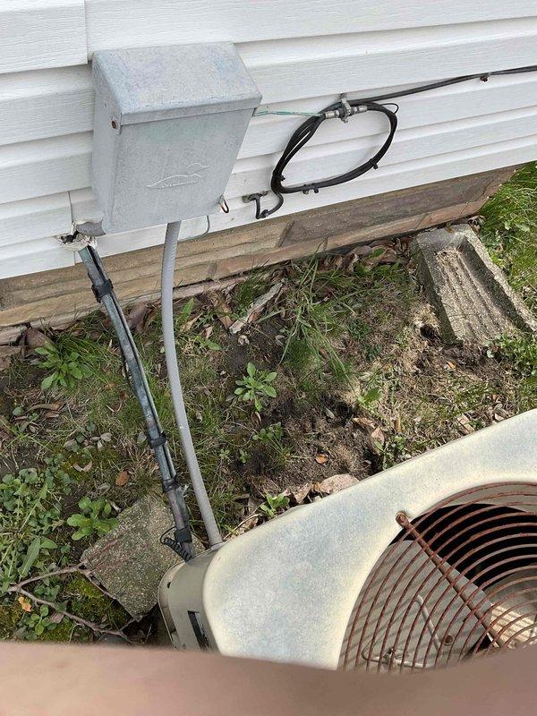 Completed comprehensive estimate for replacement of existing outdoor air conditioning condensing unit and indoor furnace system. Evaluated current equipment condition, noting weathered outdoor unit with aging components and existing basement furnace installation, documented electrical disconnect configuration and venting systems, assessed installation site conditions including concrete pad placement and clearances, and provided detailed replacement recommendations for complete HVAC system upgrade.