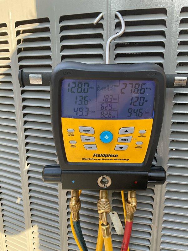 Responded to no-cooling call on club AC unit. Upon arrival, unit was non-operational. Performed diagnostic testing using digital manifold gauges to measure refrigerant pressures and temperatures across the system. Recorded superheat and subcooling values to assess refrigerant charge and system performance. Connected manifold gauge set to service ports and monitored operating pressures on both high and low sides of the system. Evaluated system parameters including suction and discharge pressures, with readings indicating proper refrigerant charge levels and compressor operation. Unit restored to normal cooling operation. All system parameters verified within manufacturer specifications.