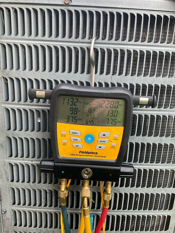 Completed Club AC8-12 preventive maintenance agreement visit on residential air conditioning system. Performed comprehensive system inspection including visual assessment of outdoor condensing unit, which showed normal weathering and debris accumulation on exterior surfaces. Utilized digital manifold gauges to measure and record refrigerant pressures and temperatures across the system, verifying proper operating parameters. All readings confirmed system is operating within manufacturer specifications with no refrigerant leaks detected or service adjustments required at this time.