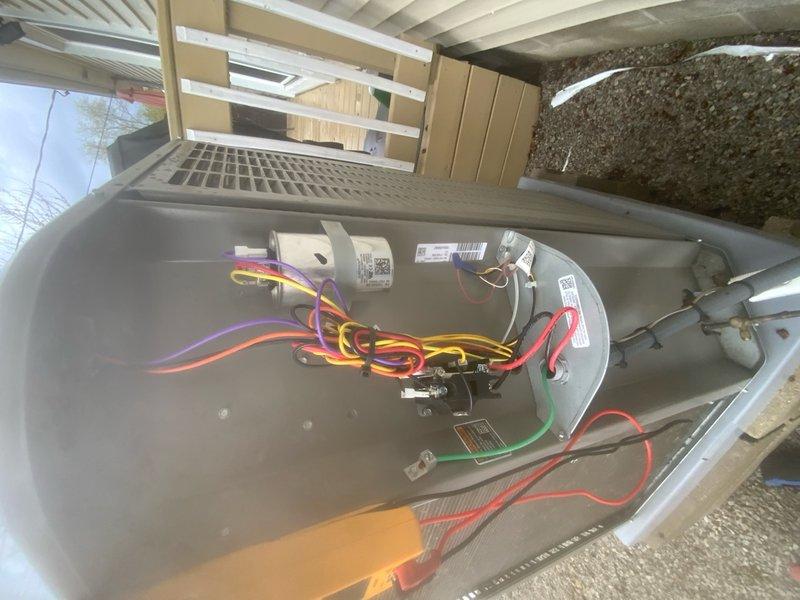 Completed prepaid AC maintenance tune-up during scheduled morning appointment window. Performed comprehensive system inspection including electrical connections, terminal blocks, control components, and wiring integrity. Inspected capacitors, relays, and control modules within outdoor condensing unit. Verified proper wire connections across all circuits including power, control, and ground wiring. Examined interior components for dust accumulation and general condition. Documented system configuration with photos of electrical compartment and internal wiring. All connections found secure and system operational upon completion of preventative maintenance service.