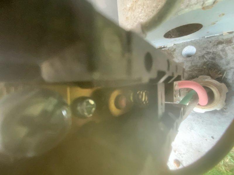 Responded to no cooling call on 10+ year old air conditioning system. Upon arrival, found unit completely inoperative with no power to outdoor condensing unit. Removed access panel and inspected internal components including compressor, capacitor, and electrical connections. Diagnosed failed dual run capacitor preventing compressor and condenser fan motor from starting. Replaced defective capacitor with properly rated replacement, verified all electrical connections were secure, and tested system operation. Unit successfully restored to normal cooling operation with proper amperage draw on both compressor and fan motor circuits.
