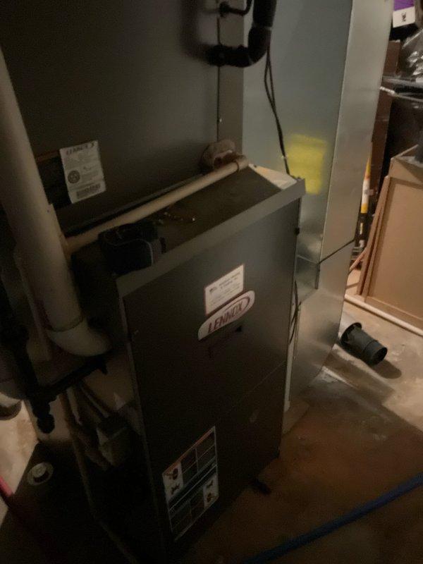 Completed comprehensive HVAC system replacement estimate for residential property, assessing existing Lennox furnace unit installed in interior utility space and outdoor air conditioning condenser unit. Documented current equipment condition, configuration, and installation parameters through detailed photographic documentation to provide accurate replacement system specifications and installation requirements.