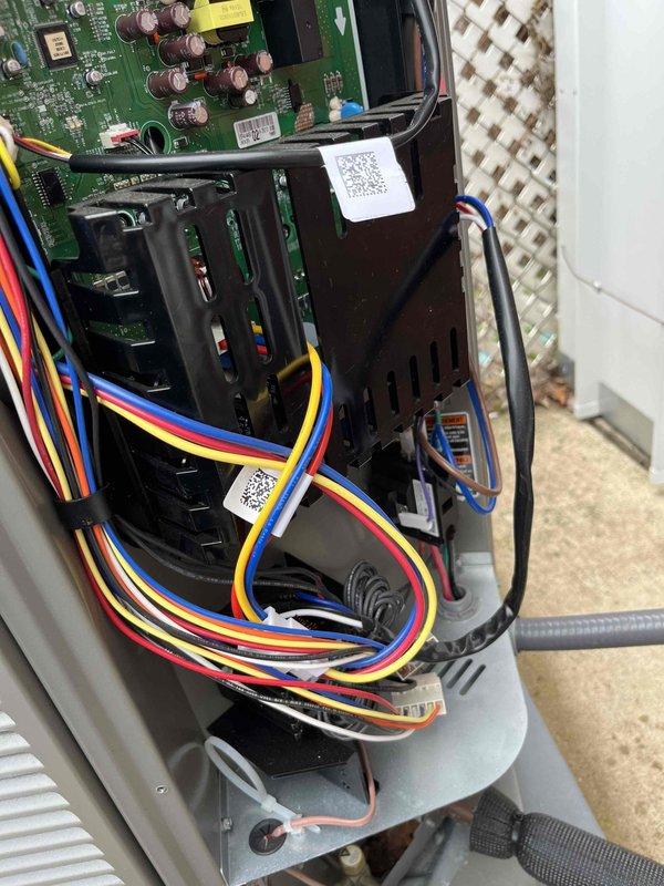 Completed prepaid AC maintenance tune-up on residential air conditioning system. Performed comprehensive inspection of outdoor condensing unit including examination of electrical control board, circuit breakers, transformer, and all wiring connections. Verified proper operation of compressor contactor and safety controls. Inspected refrigerant line connections at service valves with brass fittings and verified insulation integrity on suction line. All electrical components, wire bundles, and connections found secure and functioning within normal parameters. System operating efficiently with no deficiencies noted.
