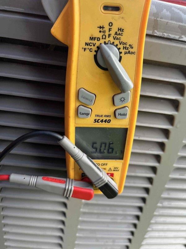 Completed preventative maintenance agreement visit for AC system as requested. Performed electrical diagnostics and system measurements using digital multimeter on outdoor condensing unit, verifying voltage and amperage readings to ensure proper operation. All measurements recorded and system found operating within normal parameters.