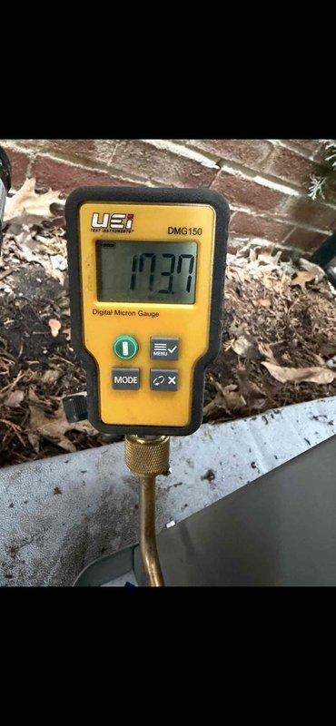 Completed installation of 2-ton air conditioning system with matching evaporator coil in left-side configuration. Performed all mechanical and electrical connections to American Standard furnace system, ensuring proper integration with existing HVAC infrastructure. System was evacuated to proper micron levels as verified by digital micron gauge reading, confirming leak-free installation and removal of moisture and non-condensables from refrigerant lines. All refrigerant connections were brazed and pressure tested, electrical wiring was completed to manufacturer specifications, and condensate drainage was properly routed. Final system startup and operational testing confirmed proper cooling performance and airflow throughout the residence.