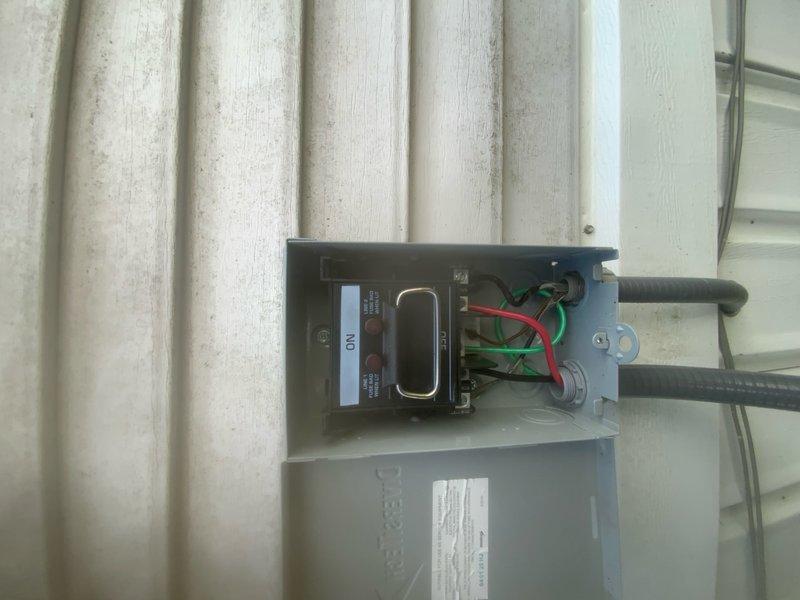 Responded to service call for furnace making loud noise when AC system activates. Inspected outdoor disconnect box and electrical connections at condensing unit. Verified proper wiring connections and confirmed disconnect switch operational. System evaluated for mechanical issues that could cause noise transmission between AC and furnace components during cooling cycle operation.