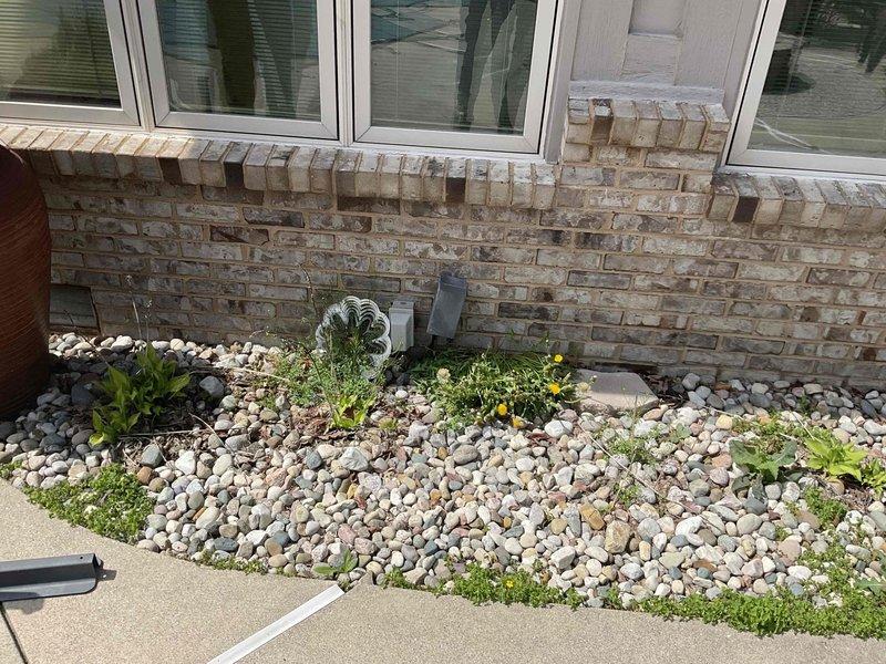 Completed comprehensive HVAC system replacement estimate for residential property, evaluating existing Bryant furnace installation within utility closet configuration and assessing exterior condenser placement options. Documentation included interior equipment positioning with vertical PVC venting and flexible ductwork routing, along with exterior foundation area evaluation for optimal condenser unit placement considering landscaping and accessibility requirements.