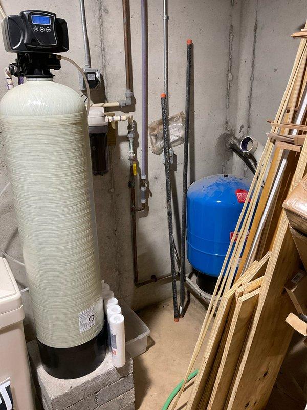 Conducted comprehensive site assessment for residential backup generator installation. Evaluated existing electrical infrastructure, utility room configuration, and available space for generator placement and associated transfer switch equipment. Documented current electrical panel setup, water treatment systems, and basement utility area to determine optimal routing for generator feed lines and ensure compliance with clearance requirements for mechanical equipment.