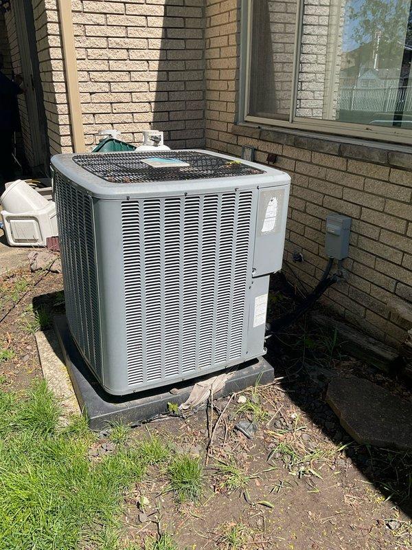 Conducted on-site assessment of residential HVAC system for replacement estimate. Evaluated existing outdoor air conditioning condenser unit positioned on concrete pad at exterior of home and inspected indoor furnace unit with associated ductwork in basement mechanical room. Documented current equipment condition, configuration, and installation parameters through photographic documentation to prepare comprehensive replacement quote for single component upgrade under partial warranty consideration.