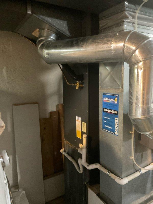 Conducted on-site assessment of residential HVAC system for replacement estimate. Evaluated existing outdoor air conditioning condenser unit positioned on concrete pad at exterior of home and inspected indoor furnace unit with associated ductwork in basement mechanical room. Documented current equipment condition, configuration, and installation parameters through photographic documentation to prepare comprehensive replacement quote for single component upgrade under partial warranty consideration.