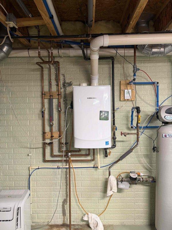 Completed full HVAC system installation including a 70,000 BTU furnace and 3-ton air conditioning unit positioned on the left side of the property. Installation encompassed all mechanical and electrical connections, including GFCI outlet assembly with weatherproof enclosure and flexible conduit routing for equipment power supply. Integrated humidifier into the system and reconnected all existing components to ensure proper operation. All ductwork, refrigerant lines, condensate drainage, and venting were properly installed and secured. System was tested and verified to be operating within manufacturer specifications upon completion.