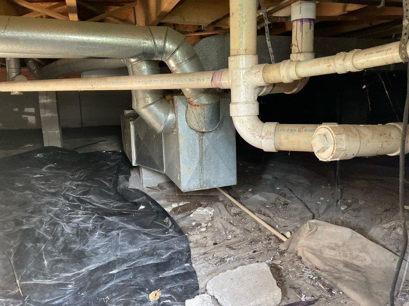 Provided estimate for future air conditioning system installation to existing residential property. Assessed crawl space conditions including existing ductwork infrastructure, vapor barrier placement, and available space for new AC equipment integration. Evaluated electrical panel capacity and location to determine compatibility with planned 8-10 SEER air conditioning unit addition.