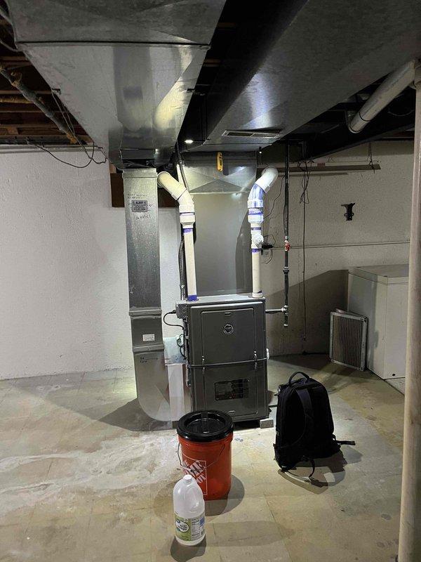 Performed comprehensive tune-up on a five-year-old furnace at a residential property with 24-hour care facility. Conducted full system inspection, measured supply air temperature at 45.7°F, verified all mechanical components, ductwork connections, and PVC venting system for proper operation. System found to be functioning within normal parameters with no immediate repairs required.