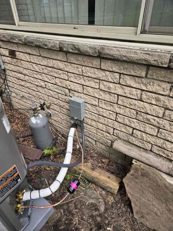 Completed installation of 3-ton air conditioning system with matching evaporator coil at rear location of residence. Installation included all necessary mechanical connections, electrical wiring, refrigerant line sets with proper insulation, condensate drainage via PVC piping to approved discharge point, and service valve configuration. System was evacuated to proper micron level as verified by digital vacuum gauge reading of 150 microns, charged with manufacturer-specified refrigerant quantity, and tested for proper operation. All connections secured and system operational upon completion.