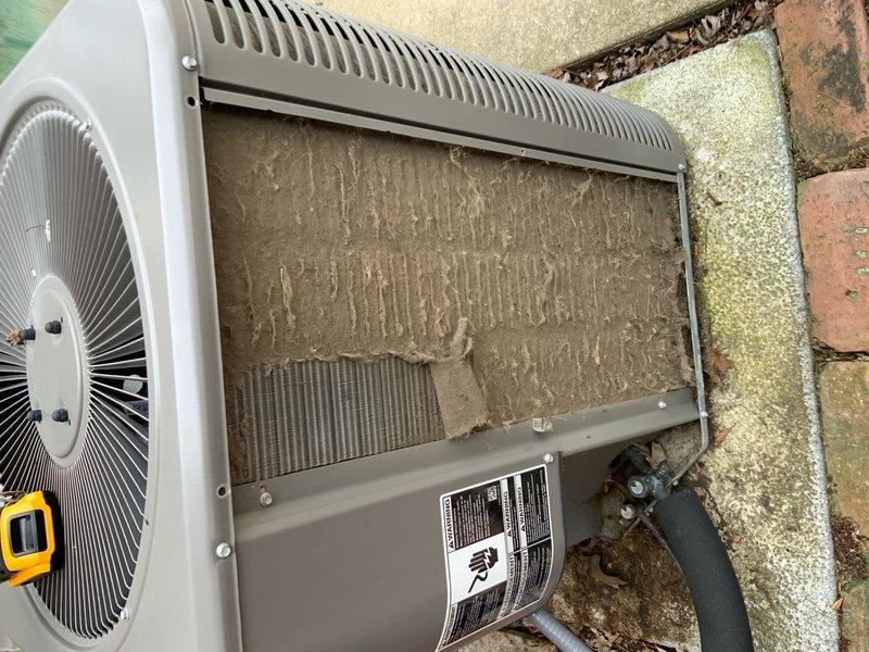 Completed annual AC maintenance visit on outdoor condensing unit. System inspection revealed heavy dirt and debris accumulation on condenser coils requiring cleaning. Performed comprehensive tune-up including coil cleaning, filter inspection, operational testing, and system diagnostics. Unit returned to proper operating condition with improved airflow efficiency.