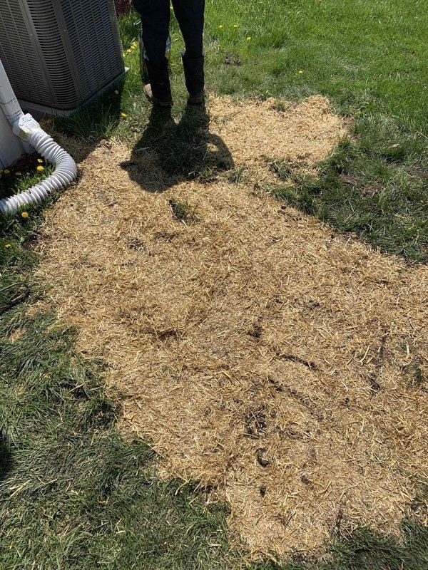 Responded to callback regarding excavation from recent AC installation that extended into adjacent property. Backfilled trench with soil, compacted material, and covered disturbed area with wood chips to match surrounding landscape. Verified HVAC condenser unit remained properly positioned and all associated ductwork connections were secure following remediation work.