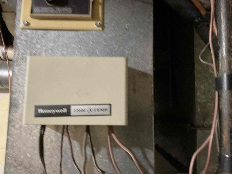 Conducted on-site evaluation of a 10-year-old Trane furnace system with a failed heat exchanger. Documented existing equipment configuration including Honeywell control module, humidifier unit, and ductwork system through photographic assessment. Prepared single component replacement estimate for furnace unit only.