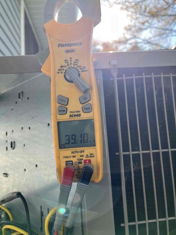 Completed Club AC8-12 maintenance agreement visit and addressed customer inquiry regarding ductwork fan installation. Performed standard system diagnostics on outdoor condensing unit, measuring compressor amperage at 39.10 amps and fan motor current at 5.6 amps, with all electrical readings within manufacturer specifications. Provided technical consultation on inline duct fan options and proper installation requirements for improved airflow distribution throughout the system.