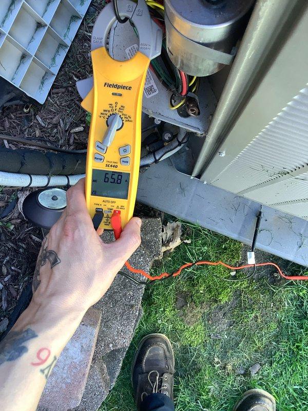 Completed routine maintenance agreement visit on HVAC system. Performed electrical diagnostics using clamp meter, recording amperage reading of 65.8 amps at outdoor condensing unit. Inspected electrical panel components including contactor, capacitors, and wiring connections; all components operating within normal parameters with no deficiencies noted.