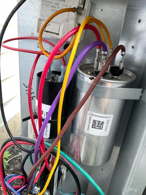 Completed scheduled AC maintenance agreement visit on outdoor condensing unit. Performed comprehensive tune-up including inspection of capacitor, electrical connections, and wiring harness; verified proper refrigerant levels; checked condenser coil condition and airflow; confirmed unit levelness using precision level tool; tested all electrical components and terminals for secure connections; inspected fan motor operation and protective guard assembly. All systems operating within normal parameters with no deficiencies noted at time of service.
