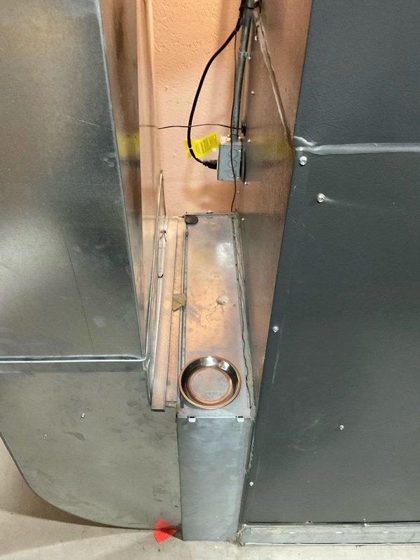 Conducted comprehensive on-site evaluation of existing 20+ year-old residential HVAC system with failed AC compressor. Assessed outdoor condenser unit condition, refrigerant line configuration, electrical disconnect setup, and indoor air handler with ductwork and condensate drainage system. Documented equipment specifications, installation layout, and system components to prepare detailed replacement estimate for complete HVAC system upgrade.