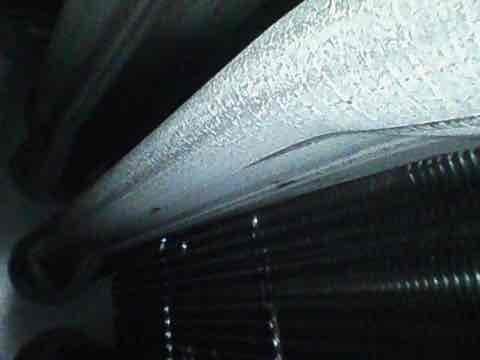 Completed prepaid membership air conditioner maintenance tune-up per scheduled appointment. Performed comprehensive system inspection including examination of evaporator coil fins and condensate drainage components in confined attic space. Inspected flexible ductwork connections and verified proper installation and support. Cleaned and evaluated heat exchanger fins, confirming optimal surface condition for thermal transfer efficiency. All components found operating within normal parameters with no immediate service needs identified.