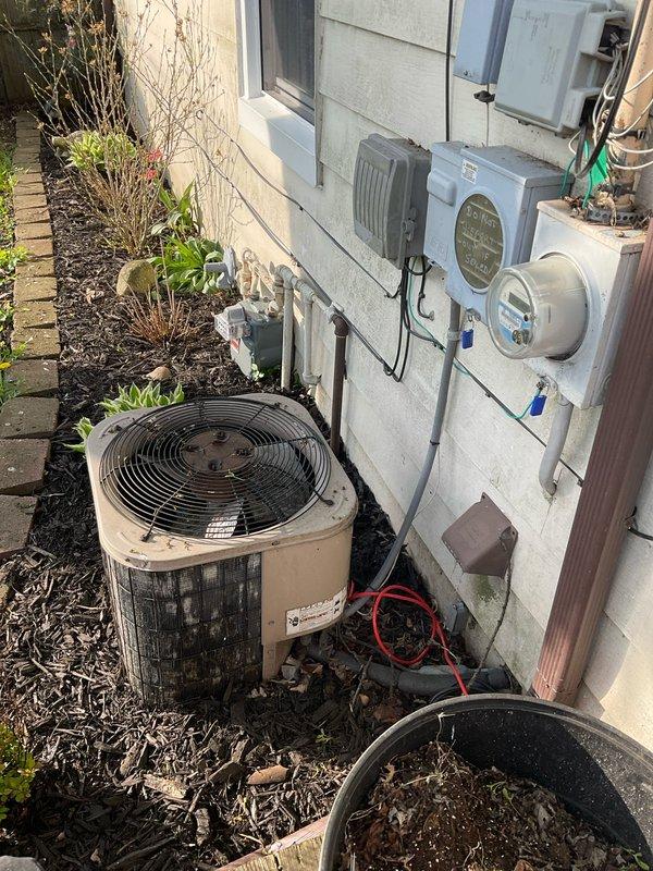 Conducted comprehensive site evaluation for complete HVAC system replacement including existing air conditioning unit and furnace. Assessed current outdoor condensing unit condition, electrical service configuration, and installation accessibility. Documented existing equipment specifications, electrical disconnect setup, and meter placement to prepare detailed replacement estimate for new heating and cooling system.