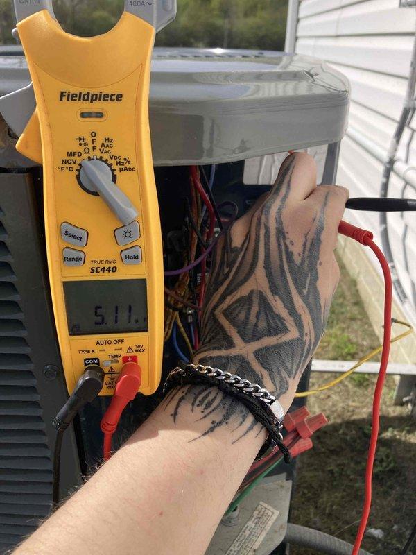 Completed scheduled AC maintenance visit as part of annual agreement. Performed comprehensive system tune-up including electrical diagnostics with clamp meter readings on outdoor condensing unit, measuring amperage draw at 5.11 amps to verify compressor performance within manufacturer specifications. Inspected indoor air handler and evaluated air filter condition, noting adequate airflow through pleated media filter. All system components operating normally with no deficiencies identified during inspection.