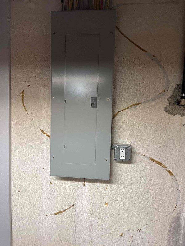 Completed full HVAC system installation including a 110,000 BTU furnace, 4-ton air conditioning unit with rear discharge configuration, and whole-home humidifier. Established all electrical connections at the panel, ran necessary wiring for system operation, mounted the outdoor condenser unit on a concrete pad against the building exterior, and reconnected all components to ensure proper system functionality.