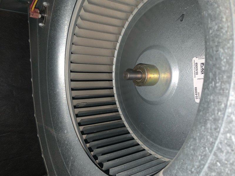 Completed scheduled AC club maintenance visit during morning service window. Performed comprehensive system inspection of evaporator coil and blower assembly. Documented heavy condensation and frost accumulation on copper refrigerant lines at evaporator coil, indicating potential airflow restriction, low refrigerant charge, or metering device issue requiring further evaluation. Inspected blower wheel assembly and verified squirrel cage fan condition with all blades intact and motor shaft properly secured. System photographed for maintenance records showing current operating conditions.