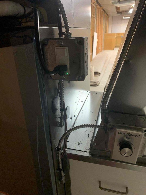 Responded to warranty call to diagnose and resolve GFCI electrical issue affecting HVAC system operation and complete exterior venting termination. Troubleshot electrical connections at junction box and variable speed control module, verified proper GFCI functionality and circuit protection. Successfully completed installation of PVC vent termination piping on exterior brick wall with proper mounting brackets, ensuring code-compliant configuration and secure attachment.