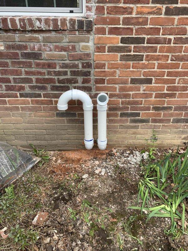 Responded to warranty call to diagnose and resolve GFCI electrical issue affecting HVAC system operation and complete exterior venting termination. Troubleshot electrical connections at junction box and variable speed control module, verified proper GFCI functionality and circuit protection. Successfully completed installation of PVC vent termination piping on exterior brick wall with proper mounting brackets, ensuring code-compliant configuration and secure attachment.