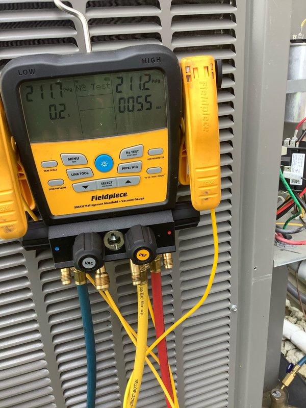 Responded to warranty call for outdoor AC unit that would not turn on. Upon arrival, performed diagnostic testing using digital manifold gauges to check refrigerant pressures and system temperatures. Identified failed capacitor as the root cause of the unit's failure to start. Replaced defective capacitor with new component and verified proper electrical connections. Tested system operation and confirmed outdoor unit now functions correctly. Measured and recorded refrigerant charge using calibrated scale, verifying system contains proper charge level of 710.5 ounces. System returned to normal operation with all components functioning as designed.